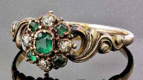 Appraisal: A late Georgian gold coloured metal mounted emerald and diamond