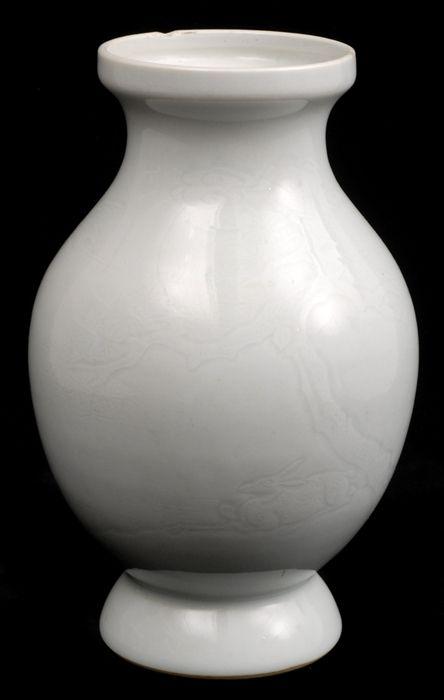 Appraisal: CHINESE CELADON-GLAZED BALUSTER-FORM VASE WITH INCISED DECORATION With deer beneath