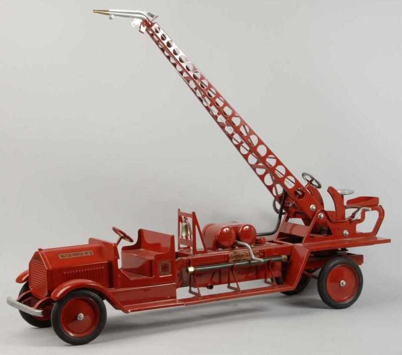 Appraisal: Pressed Steel Sturditoy Water Tower Fire Truck Description American Marked