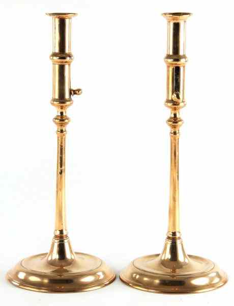 Appraisal: Pair of Copper Push-Up Candlesticks th century tall elegant form