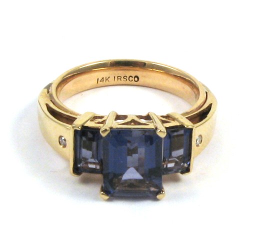 Appraisal: IOLITE DIAMOND AND TWELVE KARAT GOLD RING set with three