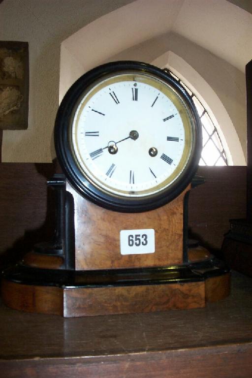 Appraisal: A mid th century walnut and ebonised mantle clock with