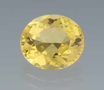 Appraisal: An Unmounted Yellow Heliodor Weighing ct oval faceted cut of