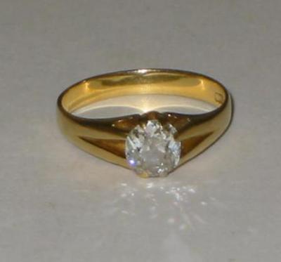 Appraisal: A DIAMOND SOLITAIRE RING the cushion cut stone approximately ct