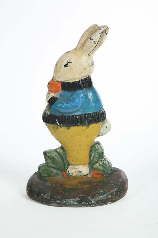 Appraisal: DOORSTOP Probably Hubley A rabbit eating a carrot wearing a