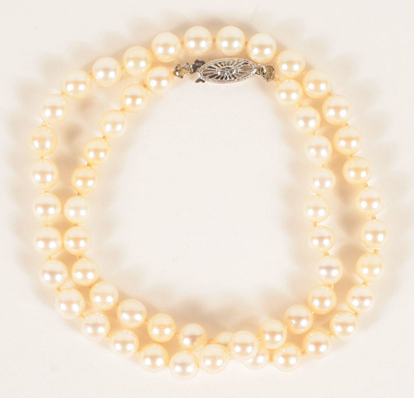 Appraisal: Cultured pearl strand necklace contains medium luster - mm pearls