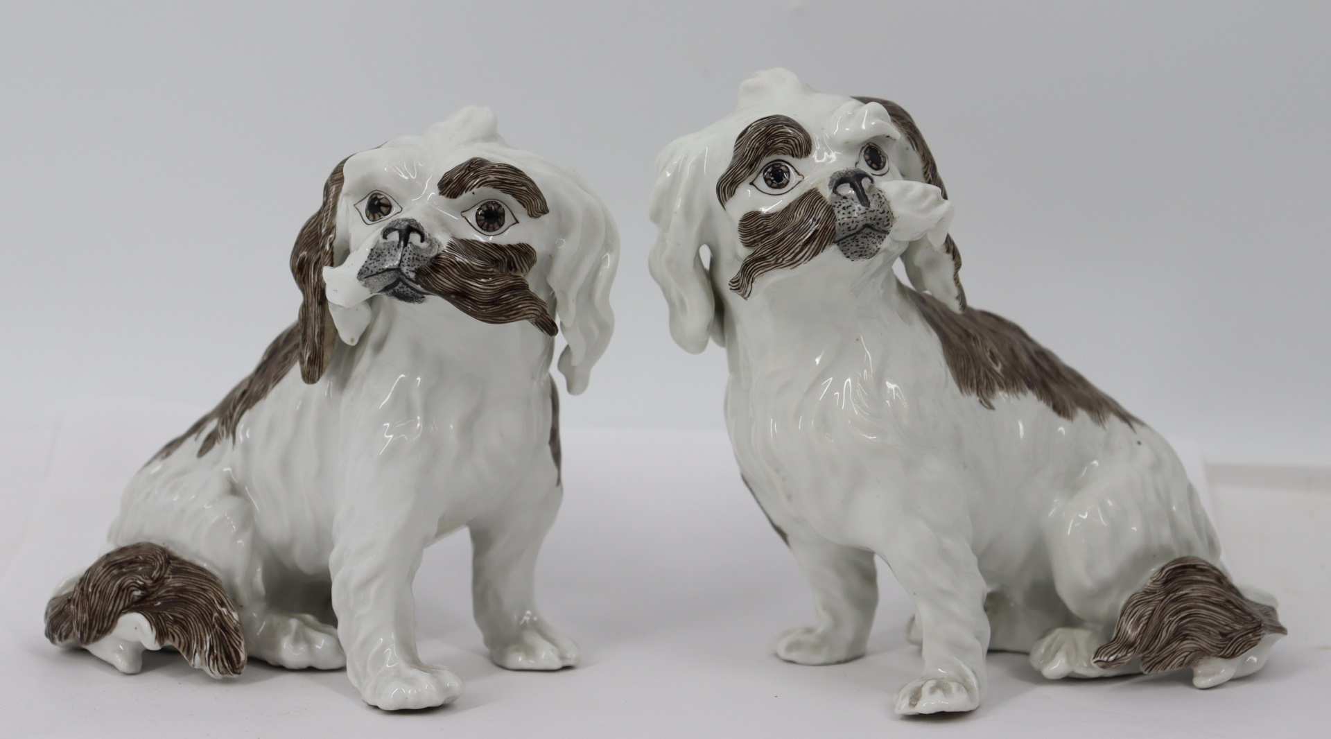 Appraisal: AN ANTIQUE PAIR OF GERMAN PORCELAIN DOGS With star mark