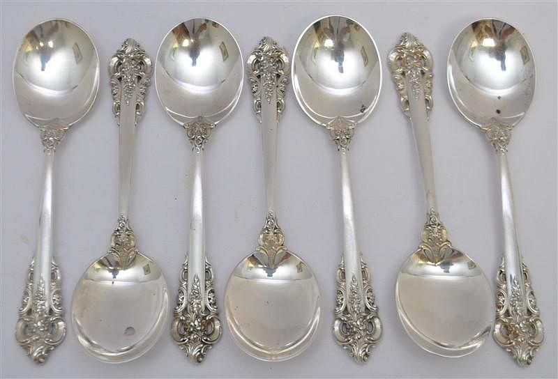 Appraisal: STERLING GRAND BAROQUE CREAM SOUP SPOONS Seven Sterling Siver Wallace