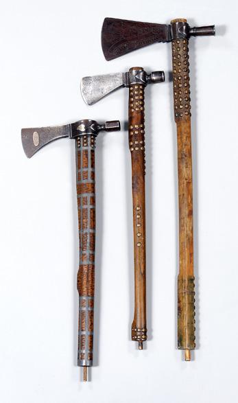 Appraisal: Three trade axes pipes all shafts with brass tack decoration