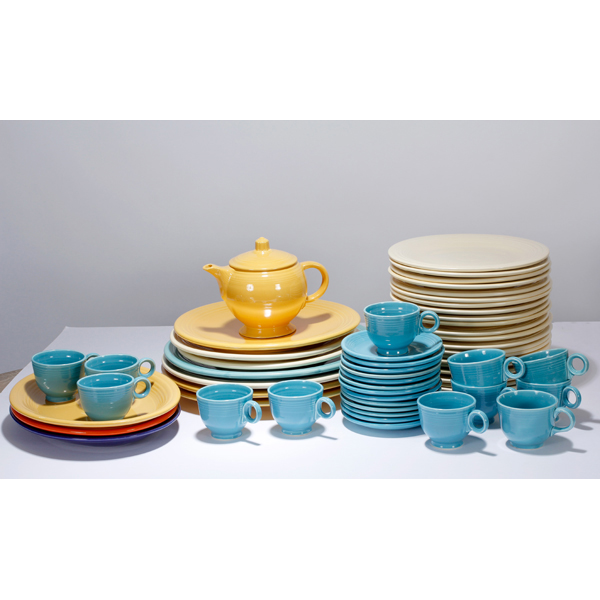 Appraisal: Pieces Fiesta Ware Turquoise teacups saucers Ivory plates Cobalt yellow