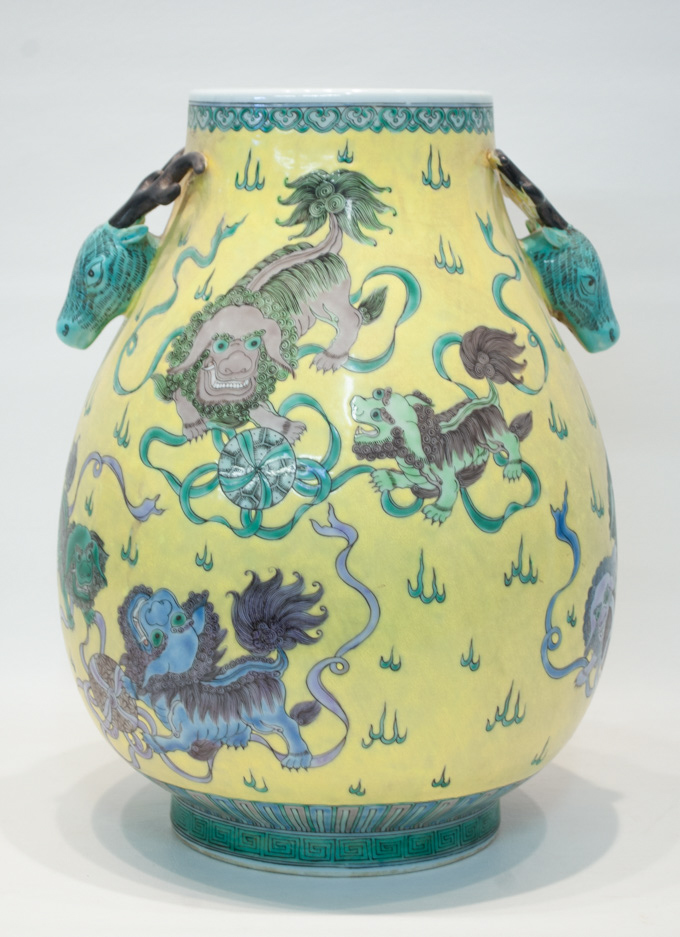 Appraisal: CHINESE PORCELAIN VASE bulbous form with deer mask handles decorated