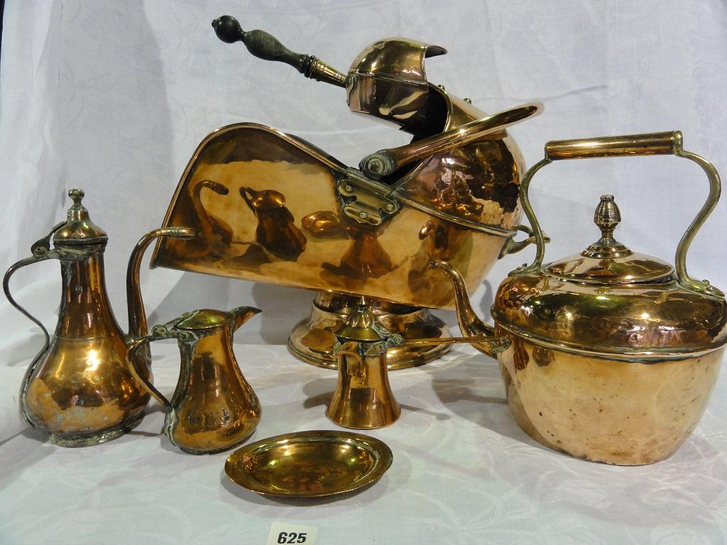 Appraisal: A copper coal scuttle complete with shovel a copper kettle