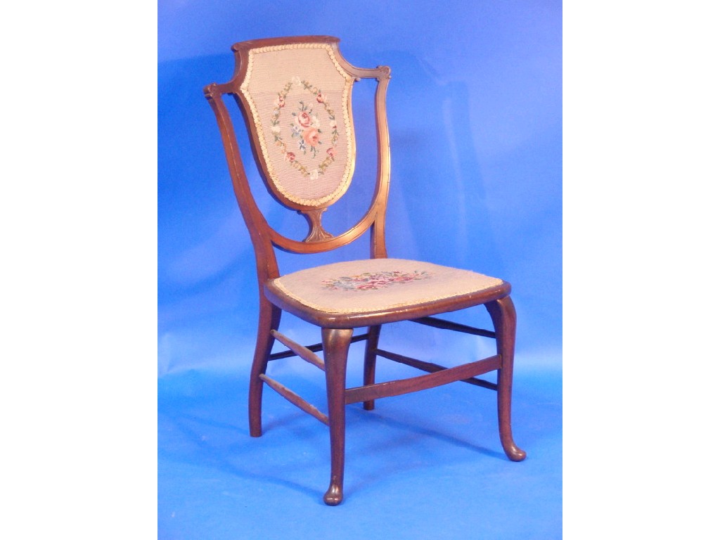 Appraisal: An Edwardian mahogany bedroom chair with woolwork seat and back