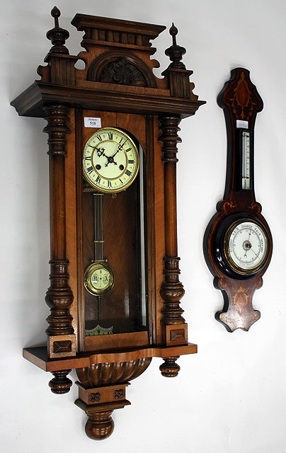 Appraisal: A CONTINENTAL WALNUT VIENNA REGULATOR TYPE WALL CLOCK the two