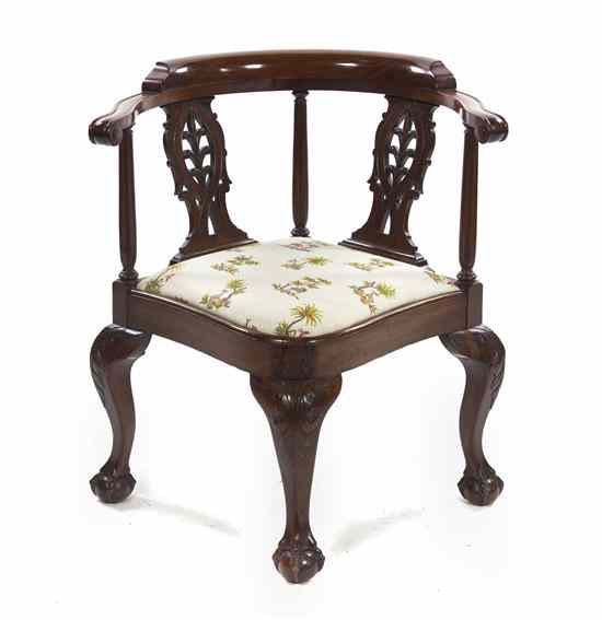 Appraisal: A George II Style Mahogany Corner Chair having a rounded