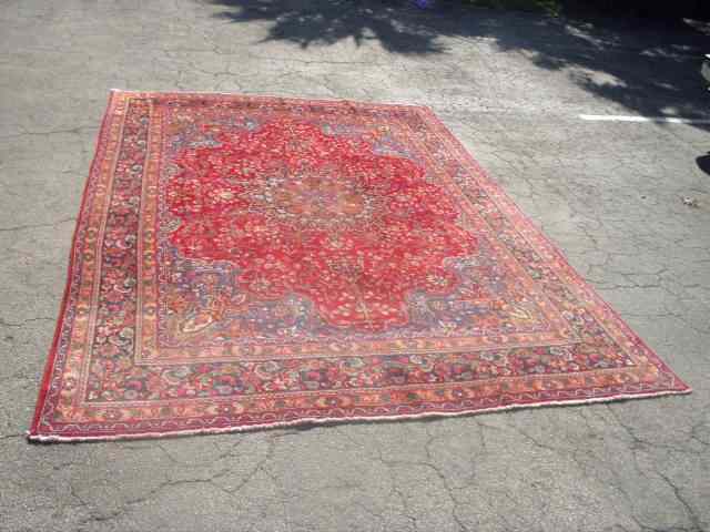 Appraisal: Large Oriental wool area rug Measures ' x ' ''