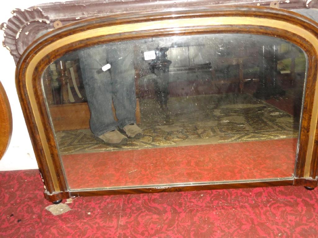 Appraisal: A Victorian figured walnut over mantle mirror of arched form