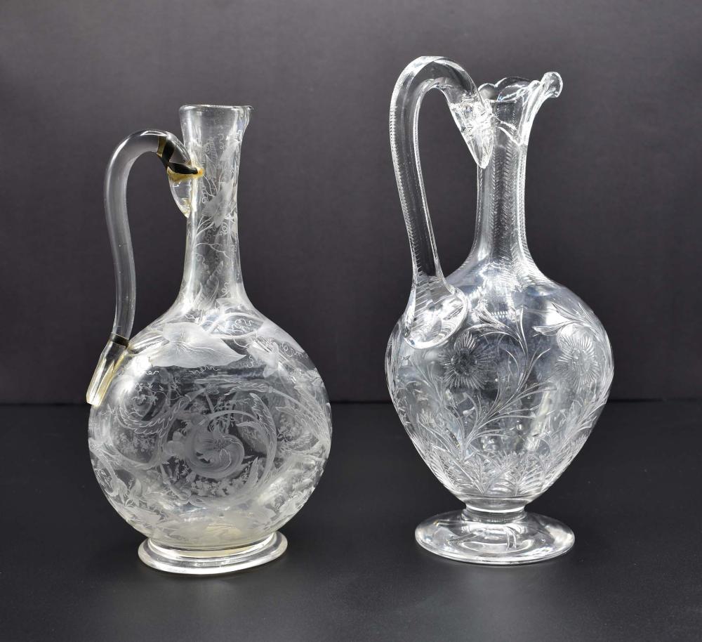 Appraisal: TWO ENGLISH WHEEL-ENGRAVED COLORLESS GLASS EWERSBoth Late th Century The