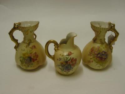 Appraisal: A PAIR OF WORCESTER BLUSH PORCELAIN JUGS dated of lobed