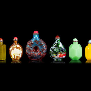 Appraisal: Six Chinese Glass Snuff Bottles TH CENTURY comprising an olive-green