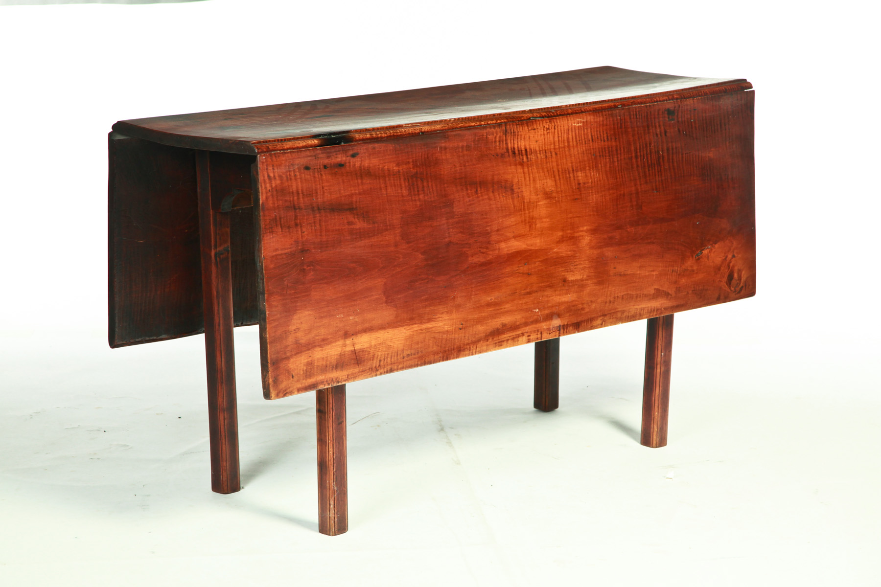 Appraisal: AMERICAN DROP LEAF TABLE Curly maple with oak and pine