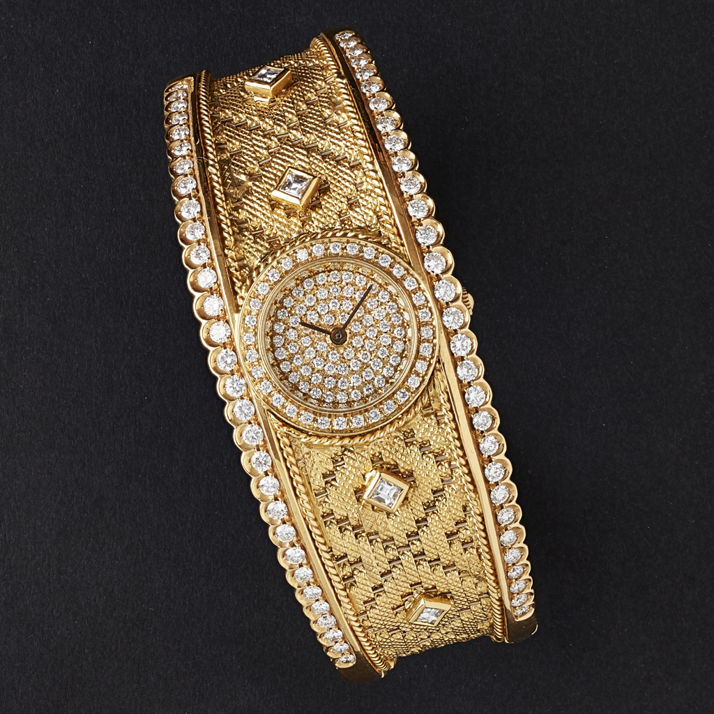 Appraisal: A diamond set bangle watchthe tapering bangle with diamond set