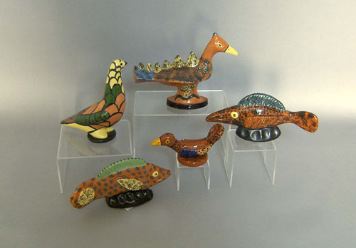 Appraisal: Three redware bird figures and two fish figures by Seagreaves