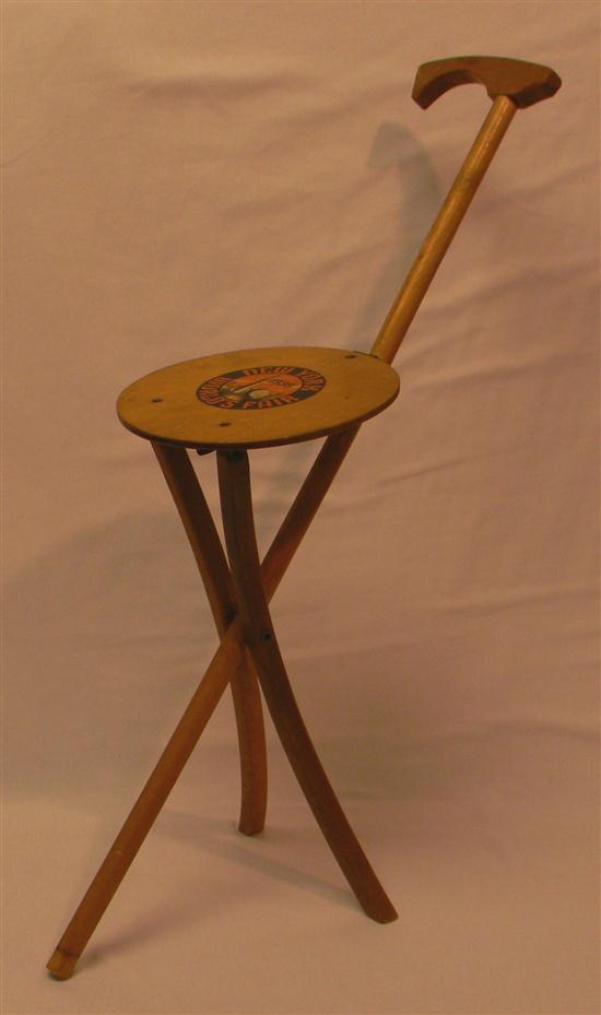 Appraisal: World's Fair walking stick stool with decal on seat