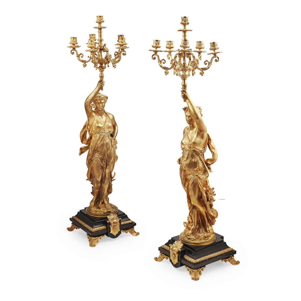 Appraisal: PAIR OF FRENCH GILT BRONZE AND SLATE FIGURAL CANDELABRA AFTER