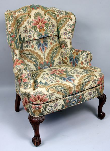 Appraisal: th Century Chippendale mahogany wing chair h x w x