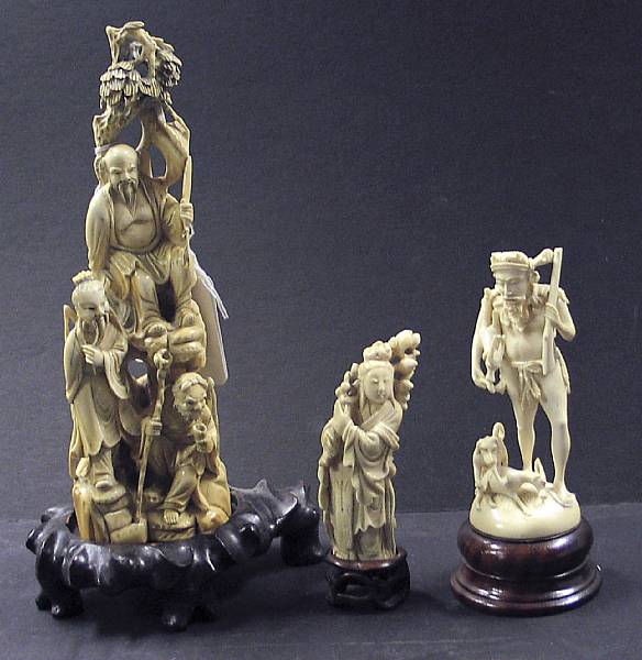 Appraisal: A group of three ivory carvings The first a Chinese