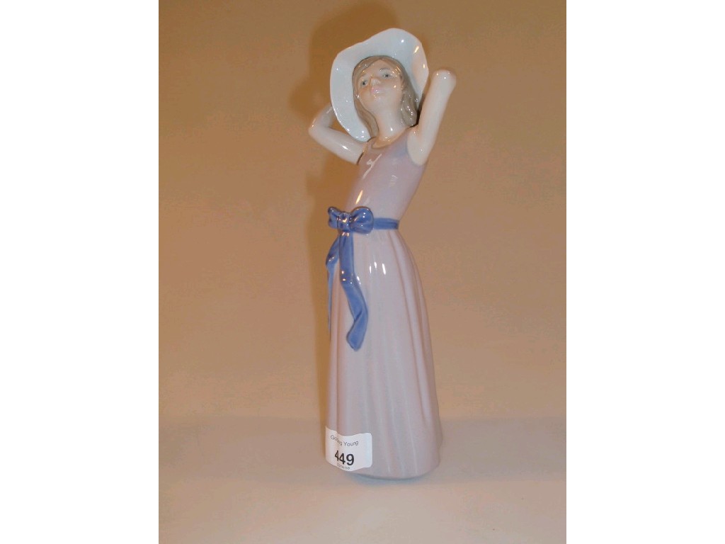 Appraisal: A Lladro figure of a young girl wearing a grey