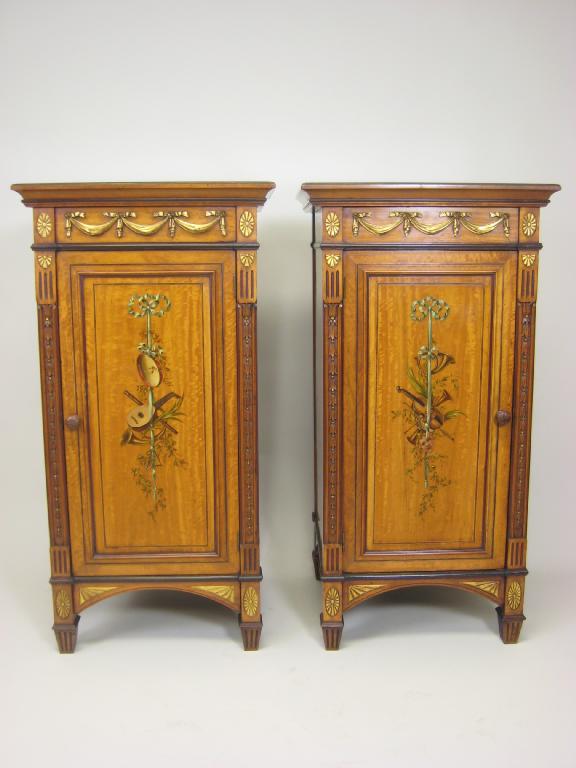 Appraisal: Pair of satinwood Pedestals the doors with inlay and painted