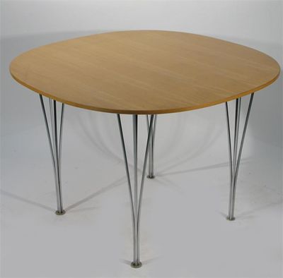 Appraisal: Superellipse' a Fritz Hansen beech wood table designed by Piet