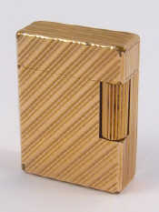 Appraisal: A gold plated Dupont gas cigarette lighter in protective pouch