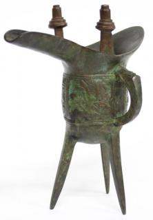 Appraisal: Chinese Archaic The ritual wine vessel on tripod legs H