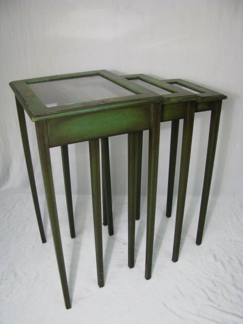 Appraisal: Three hand painted Chinoiserie nesting tables Green wood glass inserts