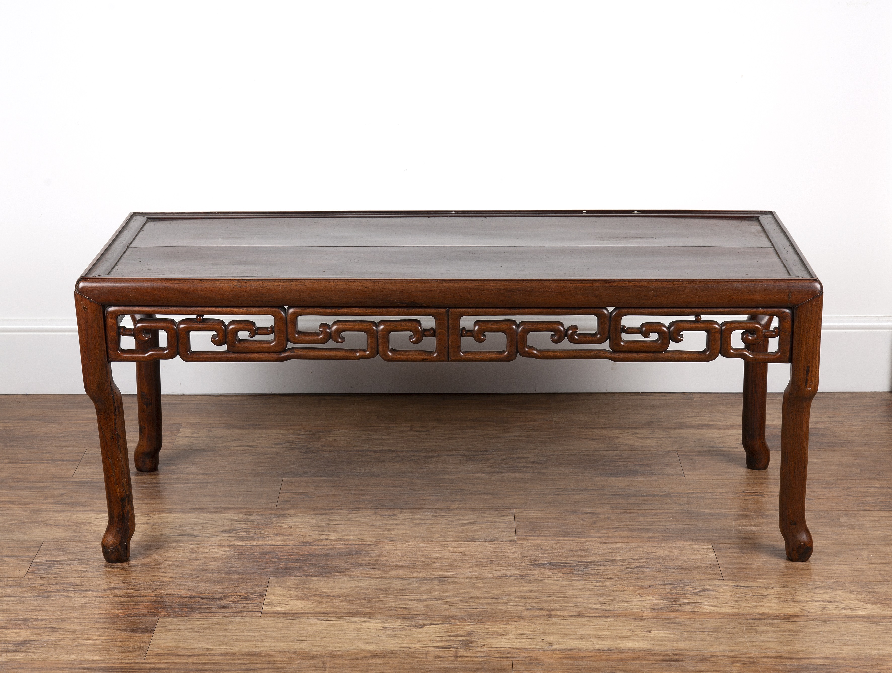 Appraisal: Chinese Hardwood low table th Century with scroll frieze and