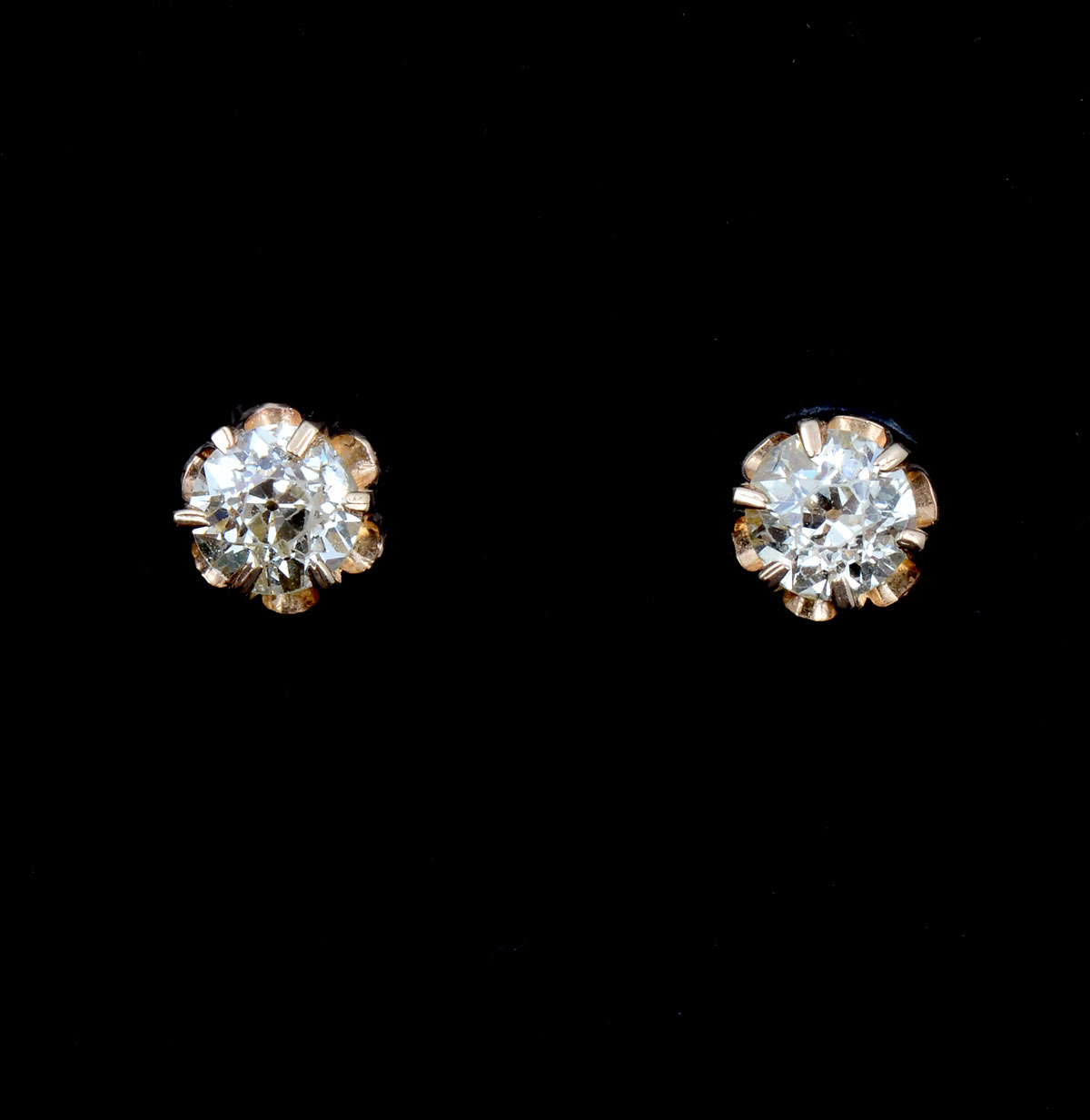 Appraisal: K CTW EDWARDIAN EAR STUDS A single old European diamond