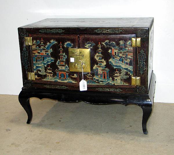 Appraisal: A Chinese export polychrome lacquered two door low cabinet The