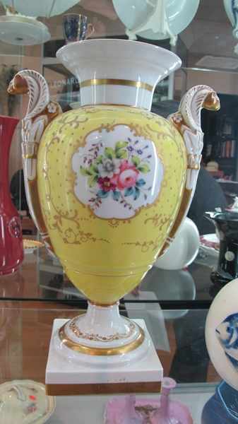 Appraisal: PORTUGESE HAND PAINTED AND GILDED PORCELAIN URN WITH YELLOW GROUND