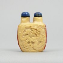 Appraisal: Hornbill Carved Snuff Bottle Hornbill ivory snuff bottle features a