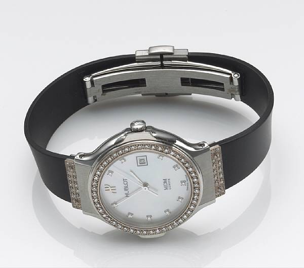 Appraisal: A ladies stainless steel and diamond set calendar wristwatch with