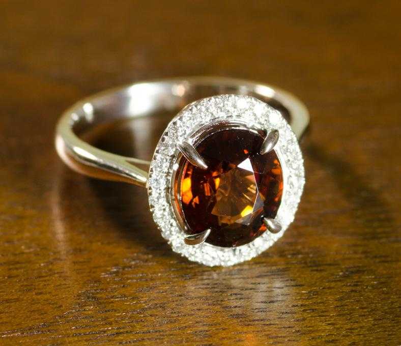 Appraisal: RED ZIRCON DIAMOND AND WHITE GOLD RING The k white