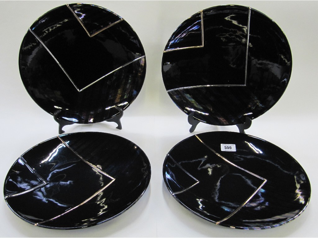 Appraisal: DAVID COHEN A set of four black glazed plaques with