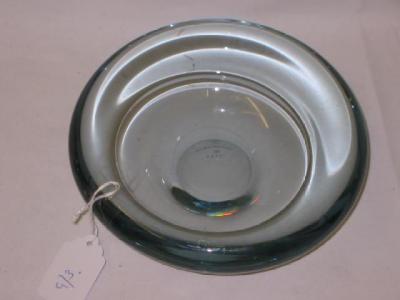 Appraisal: A HOLMGAARD GLASS BOWL of shallow circular form tinged green