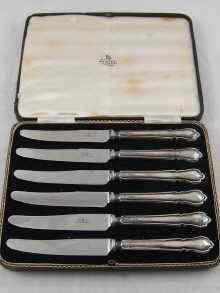 Appraisal: A boxed set of silver handled tea knives by Asprey