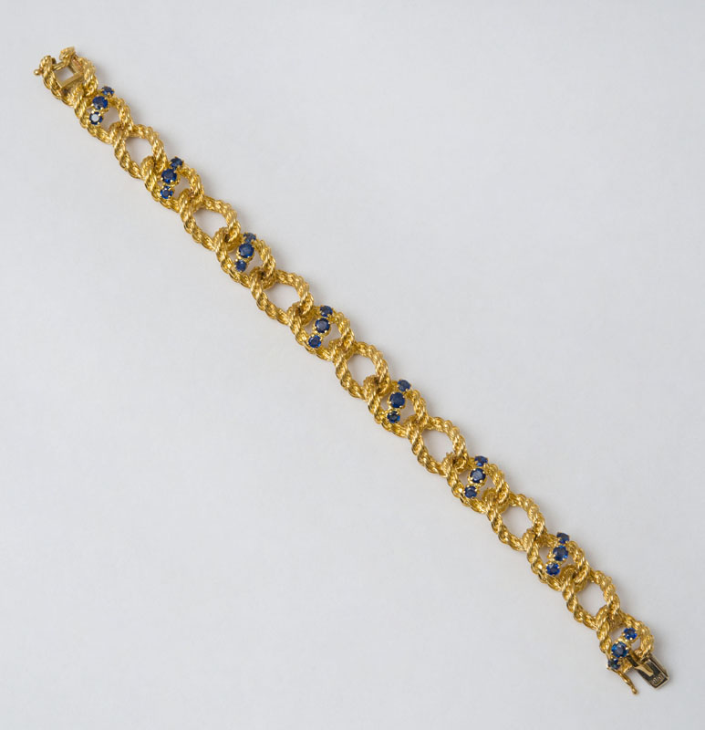 Appraisal: K GOLD AND SAPPHIRE BRACELET Set with round cut sapphires