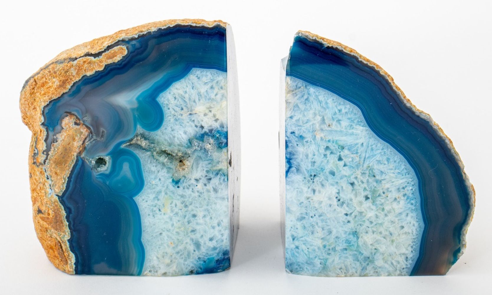 Appraisal: BRAZILIAN OCEAN BLUE AGATE BOOK END PAIR Pair of Brazilian