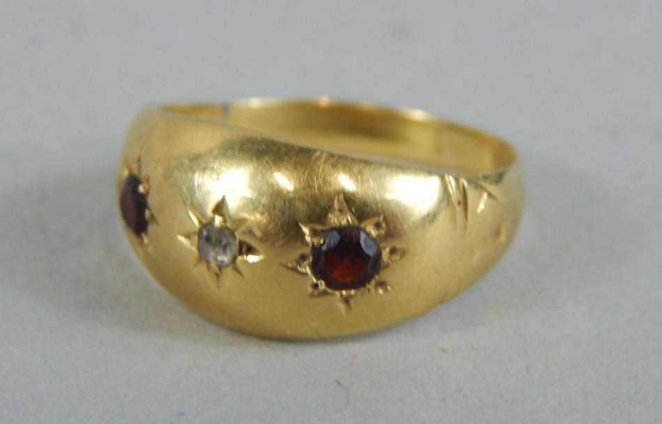 Appraisal: An ct gold dress ring set with two garnets and